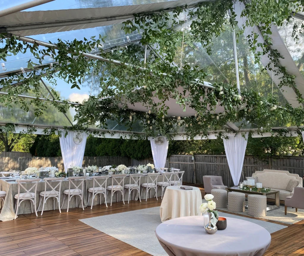 Wedding reception setup inside Anchor Industries clear span tent